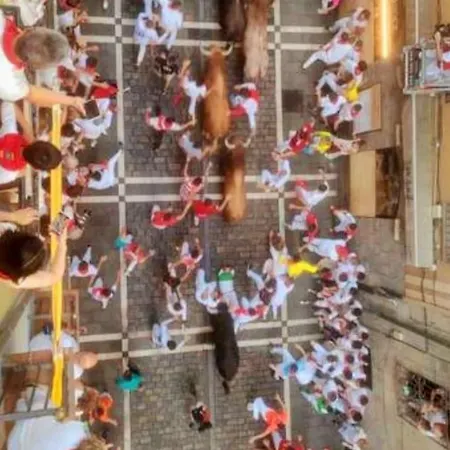 Experience The Running Of The Bulls From Your Balcony Apartment *